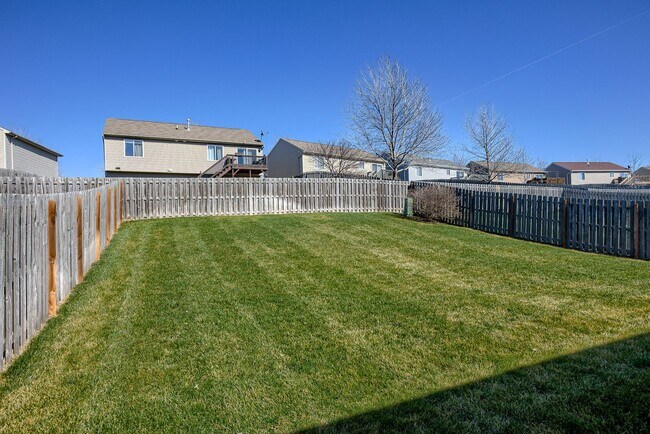 Building Photo - Bright & Spacious Elkhorn Home with Finish...