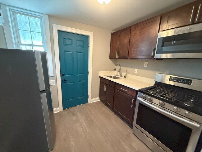 Building Photo - Fully Renovated 2BR Home w/ Fenced Yard & ...
