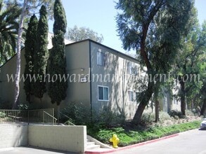 Building Photo - Bonus Den! Beautiful lower condo with large patio in Tara Hills, a resort style living complex!