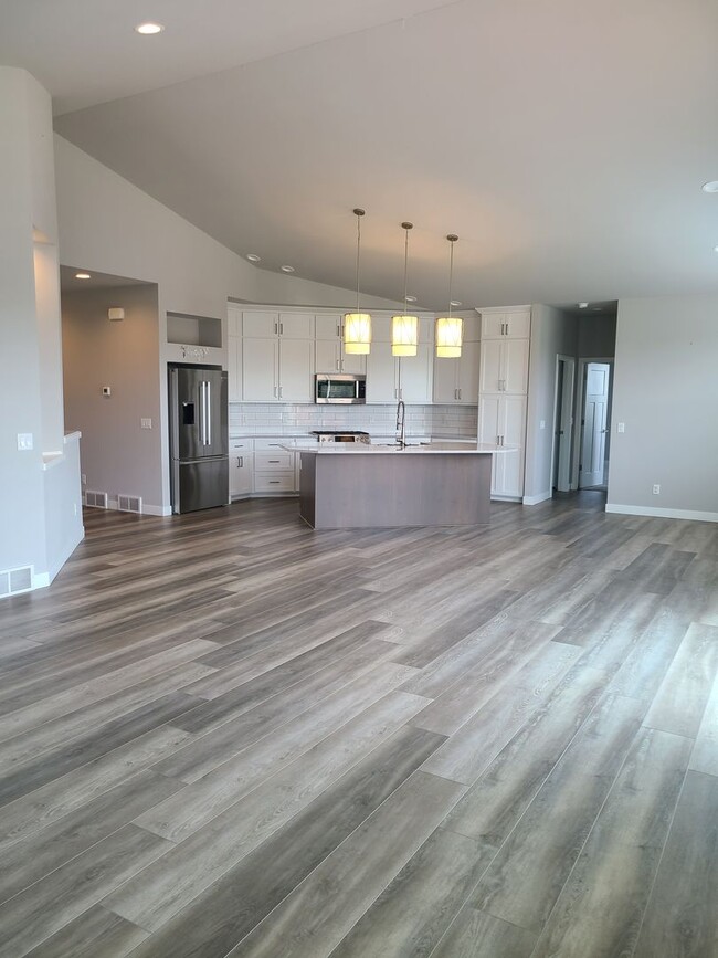 Building Photo - Four Bedroom Three Bath Single Family Home