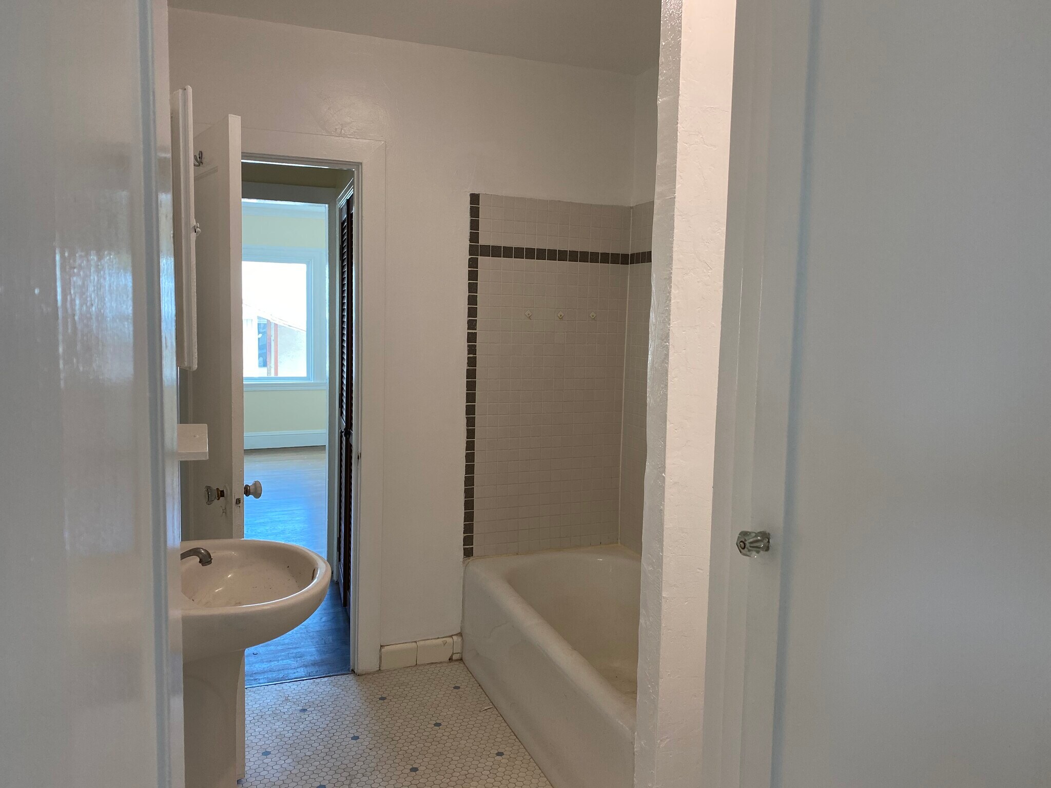 upstairs bathroom with tub - 567 59th St