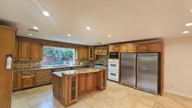 Building Photo - Exquisite 4 Bedroom + Office Single-Level Residence with Pool/BBQ in a Prime South-of-the-Bouleva...