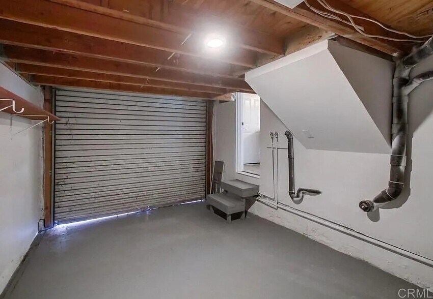 garage is small- can fit small car or used as storage space - 3596 44th St