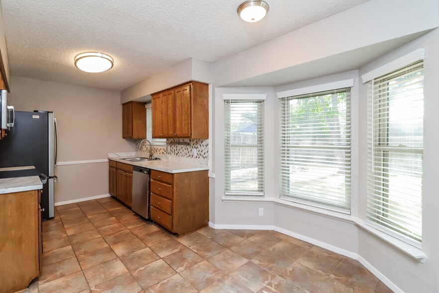 Building Photo - 5911 Woodsetter Ln