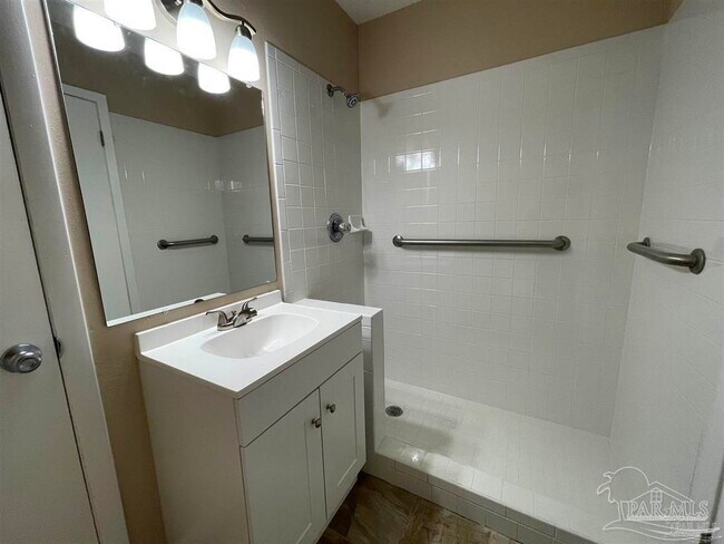 Building Photo - 6975 Woodley Dr