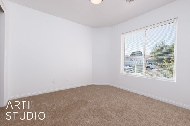 Building Photo - 3-bedroom 2-bathroom townhouse with a 1-ca...