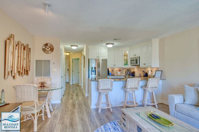 Building Photo - FULLY FURNISHED OFF-SEASON VACATION RENTAL...