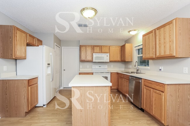 Building Photo - Your Dream Awaits: A Haven of Style and Se...