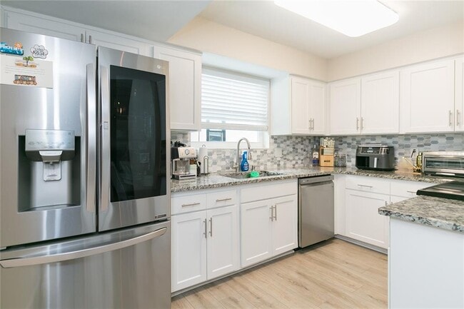 Building Photo - 7308 S Juanita St