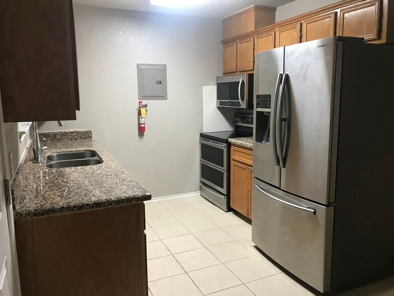 New stainless steel appliances. - 1801 Lexington Circle
