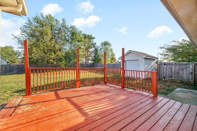 Building Photo - Adorable home with fenced back yard coming...