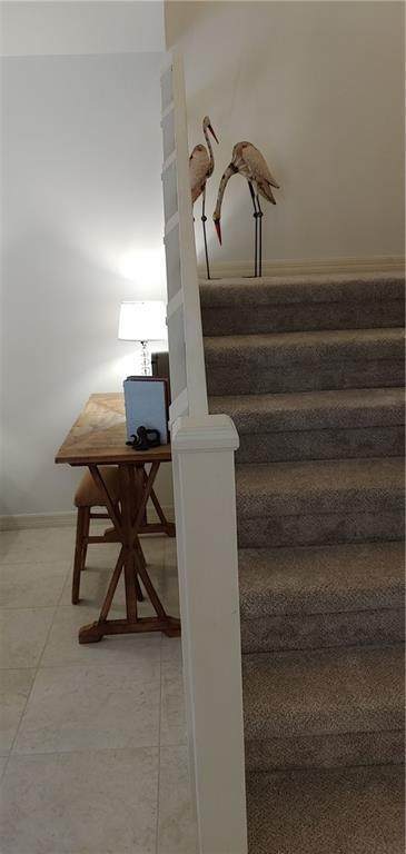 Living Room / Stairs - 1001 Royal Palm Blvd