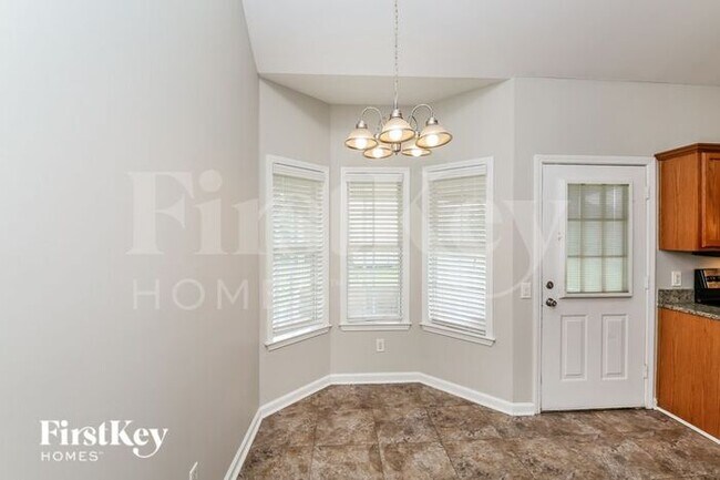 Building Photo - 8595 Shady Elm Dr