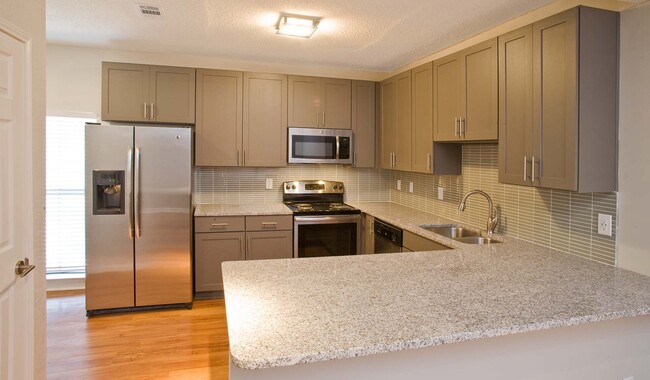 Brand-new kitchens available with stainless steel appliances and granite countertops - Hillmeade Apartment Homes