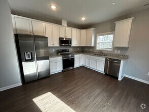 Building Photo - Beautiful 4-Bedroom Home with Serene Outdo...
