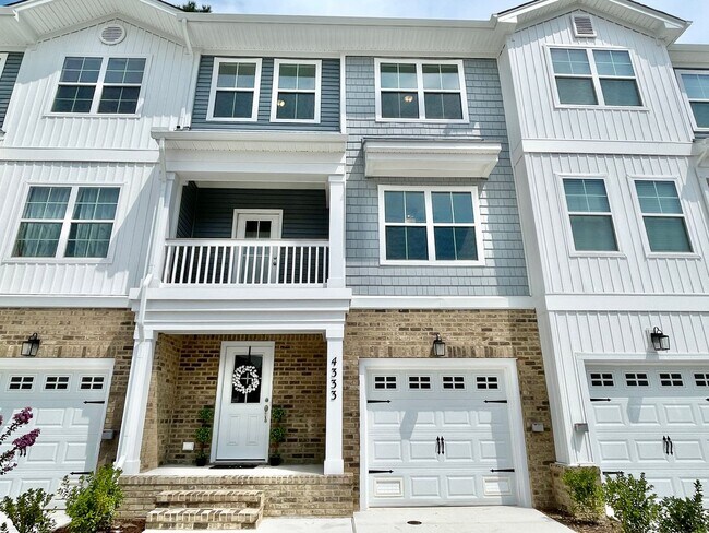 Building Photo - Practically New & Available NOW! Americana...