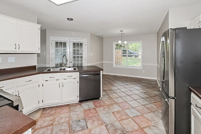 Building Photo - 5759 Michaelson Dr