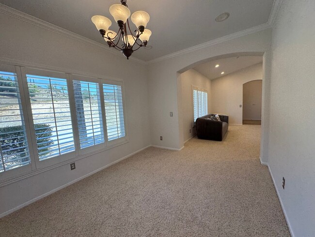 Building Photo - Stunning 4BR/3BA Pool Home in Singing Hill...
