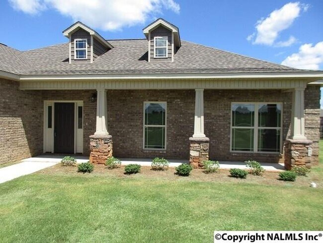 Building Photo - LIKE NEW!  FOUR BEDROOM BRICK HOME IN HAZE...