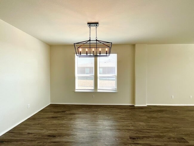 Building Photo - AVAILABLE NOW- Energy-Efficient 4/3 Home with Solar Panels & Pool Access!