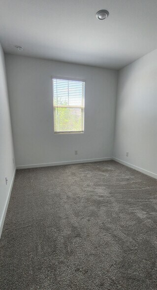 Bedroom near main entry - 2192 W Sierra Sunset Trl