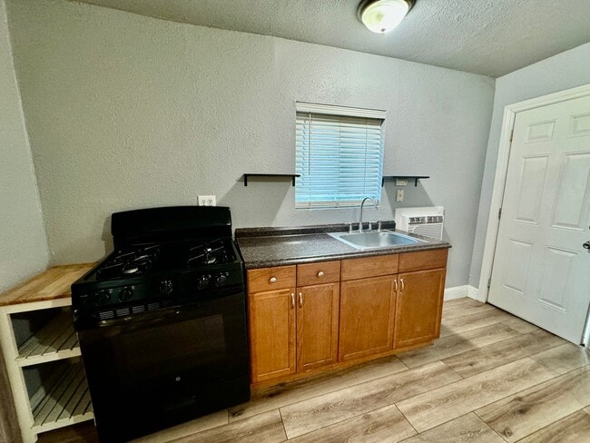 Building Photo - NOW AVAILABLE - 628 S FT STUDIO ON LARGE LOT