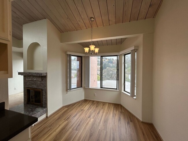 Building Photo - Large 2 BR / 2 BA featuring Cathedral Ceilings, Washer & Dryer, Plus Parking Included!