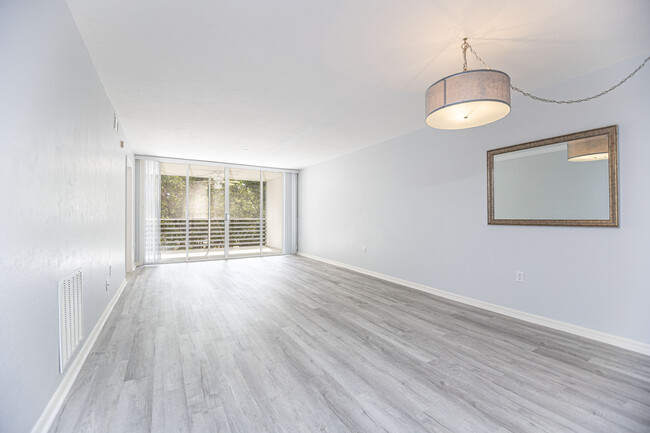 Living room/ dining combo - 290 Naples Cove Dr