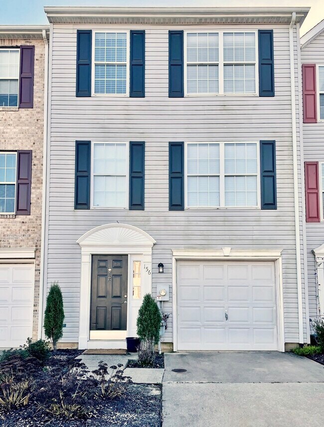 Front w/ Driveway & Garage - 156 Versailles Ct