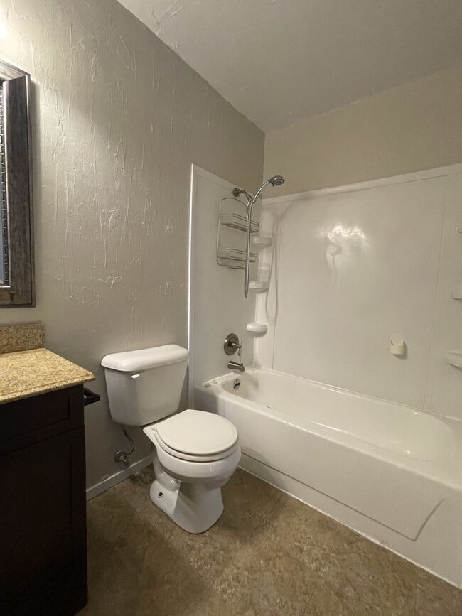 Building Photo - Spacious Snyder Home: 3 Beds, 2 Baths, 2-Car Garage & Cozy Carpeted Bedrooms!
