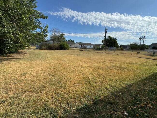 Building Photo - 5407 NW Kinyon- COMING SOON!