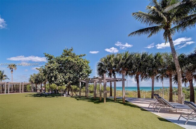 Building Photo - 6899 Collins Ave