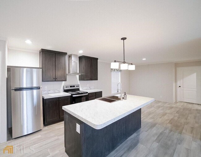 Building Photo - Spacious 4-Bedroom Home with Lawn Maintena...