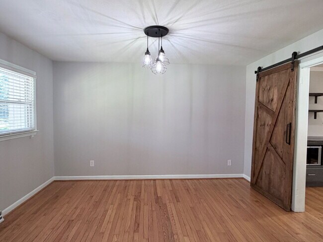 Building Photo - Updated 3BR Home in Beaver Lake | Fenced Yard, Garage, Covered Porch & Outdoor Fireplace | Pet Fr...