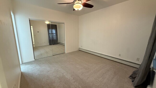 Building Photo - Major Updates! Raised Ranch Style Condo wi...
