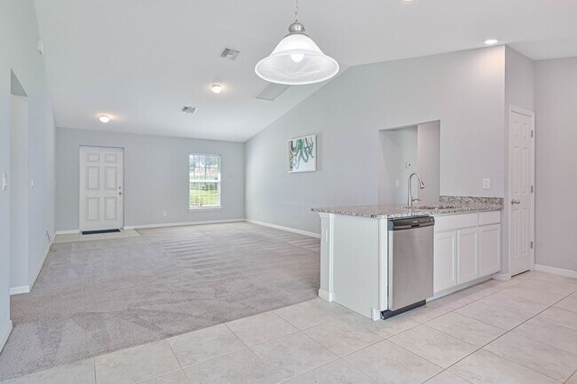 Building Photo - Spacious Three-Bedroom Home with Open Floor Plan, Large Yard