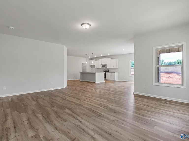 Main Hall and Kitchen - 104 Striker Ln