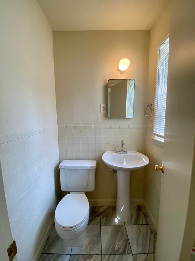 Building Photo - Available June 29: 4 Bedroom Unit in Estab...