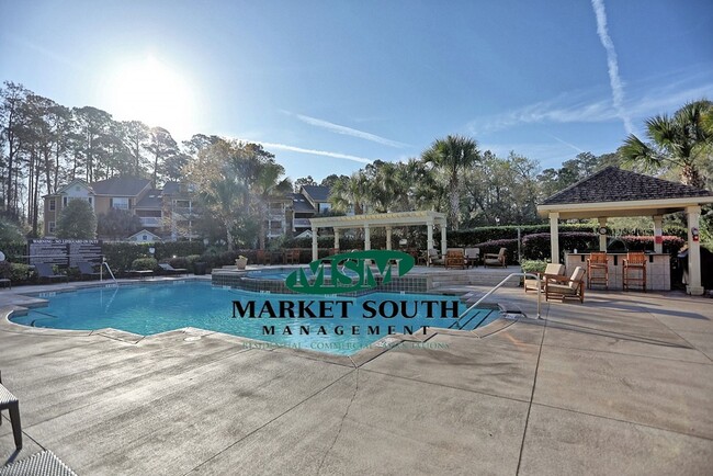 Building Photo - STUNNING GATED COMMUNITY CONDO ON WHITEMAR...