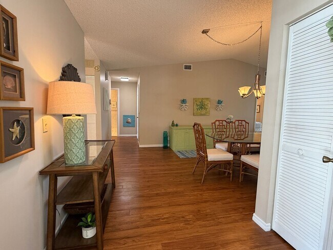 Building Photo - Furnished 2 BR , 2 Bath condo - with Heated Pool and Security Gate