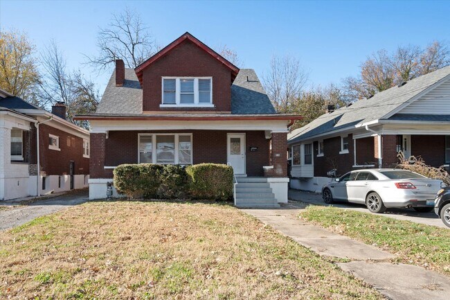 Primary Photo - Spacious 4BR/2BA Home with Hardwood Floors Throughout!