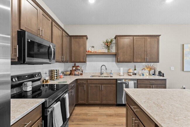Building Photo - 3BR Center Lake Townhome | 2-Car Garage, Loft & Resort-Style Amenities