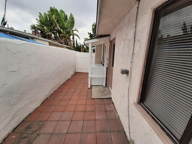 Private Back Patio w/Laundry Area - 205 N Florence St