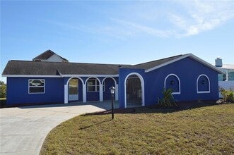 Building Photo - 6525 Manila Palm Way