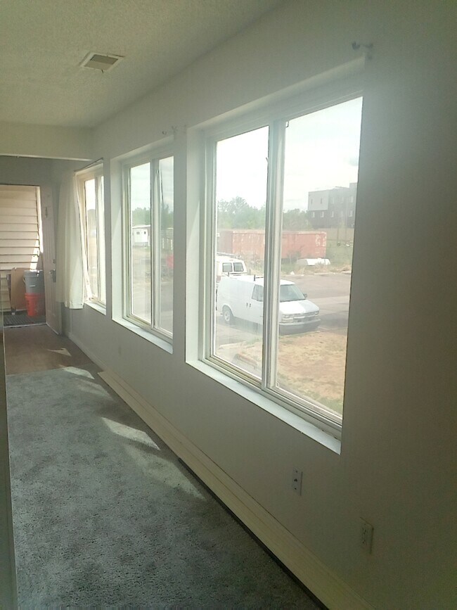 Wall of windows - 10762 E Exposition Ave