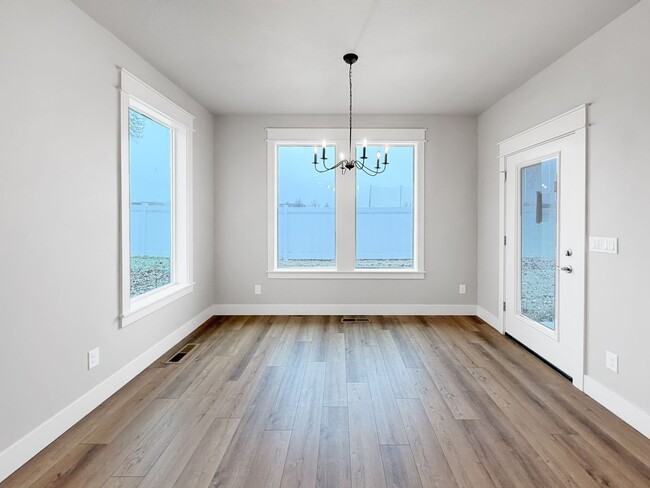 Building Photo - Brand New 4-Bedroom Home in Pheasant Meadows with 3-Car Garage Near Shopping and Dining