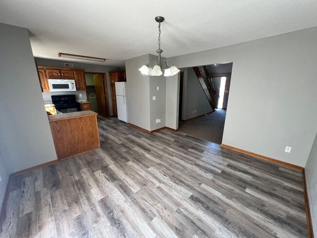 Building Photo - 3 Bed, 1.5 Bath Duplex with Garage and Extra Storage Space!