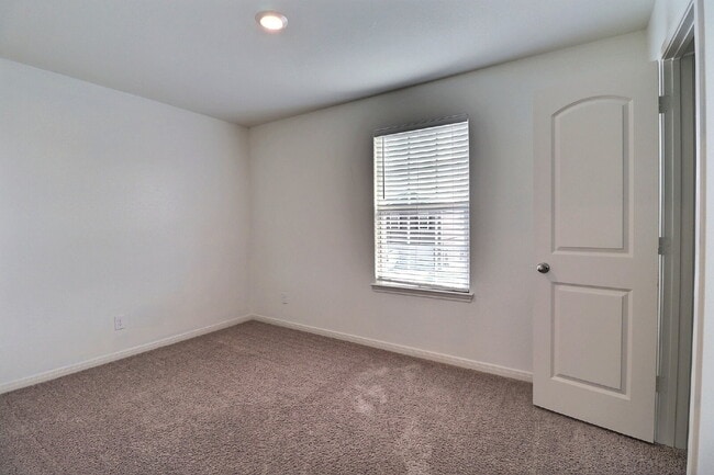 Building Photo - Move-In Ready 3-Bed Home with Solar Panels + Washer, Dryer & Refrigerator — Half Off Second Full ...