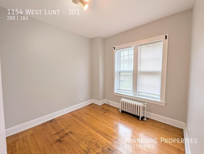 Building Photo - 1154 West Lunt-301