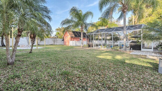 Building Photo - Luxurious FURNISHED 4BR/3BA Pool Home with...